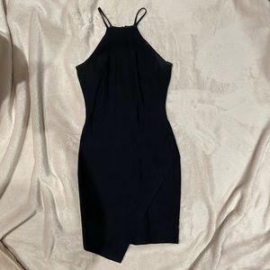 Small fitted black dress asymmetrical hem